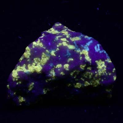 Fluorescent Norbergite (yellow) with Diopside (blue) from Ogdensberg, New Jersey